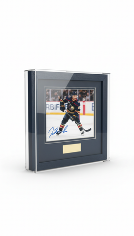 Framed Puck Signed After Overtime Win